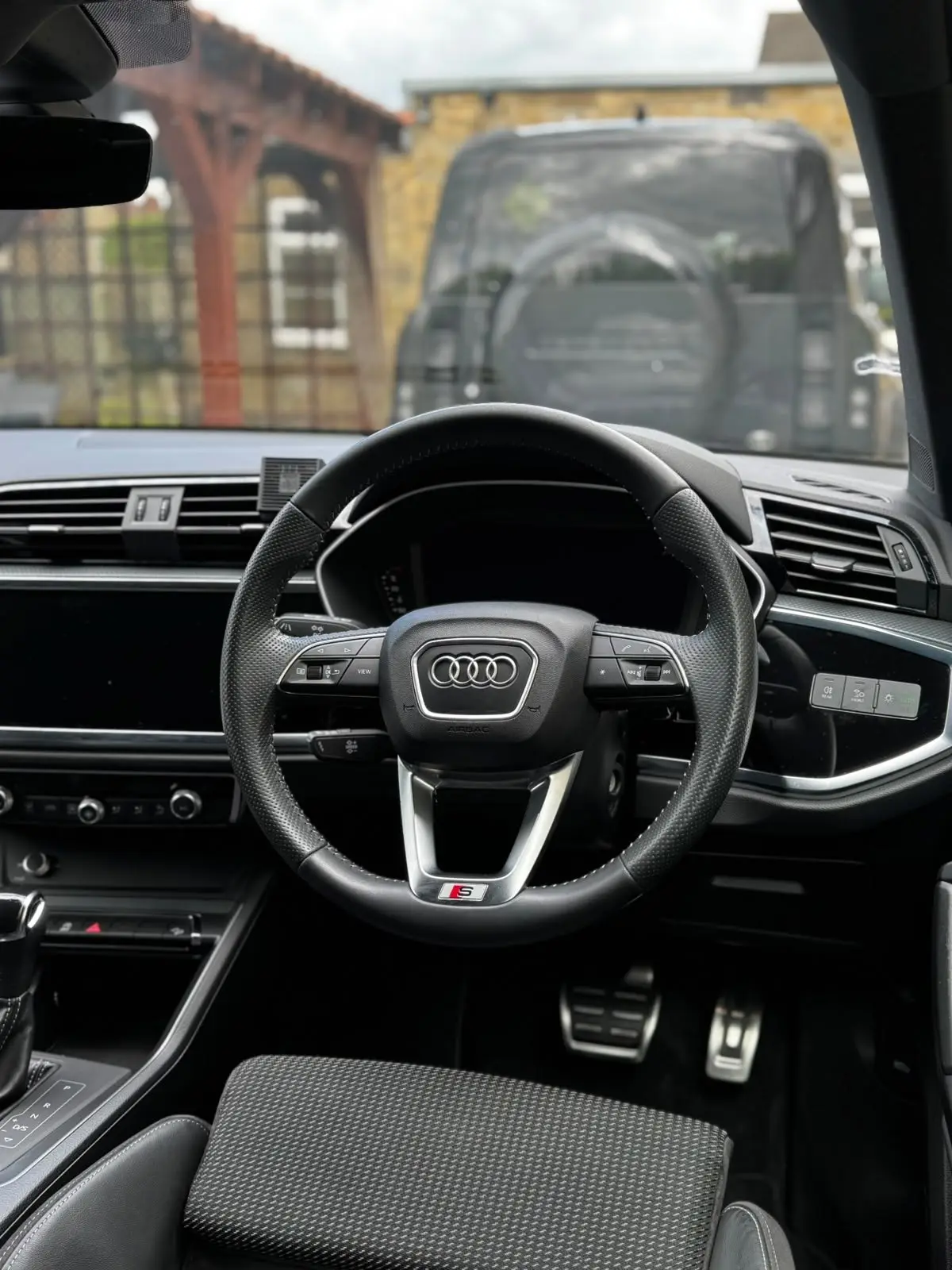 Cleaned Audi Q3 steering wheel, dash and pedals